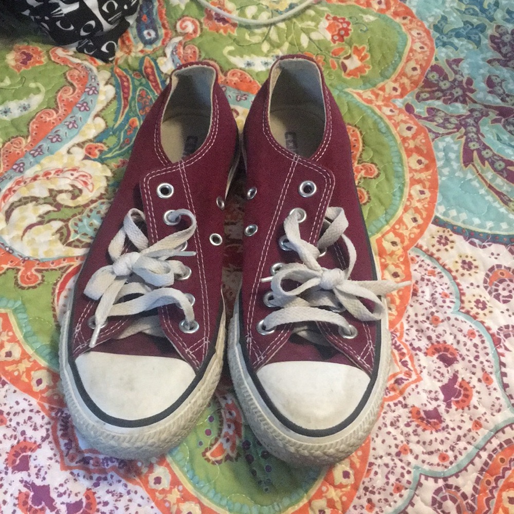 lightly worn brick red chuck taylor’s